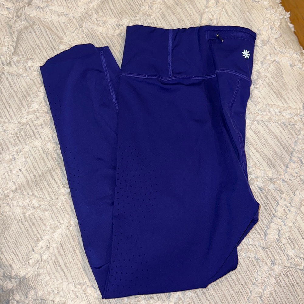 Womens purple athleta leggings with cutout leg detail